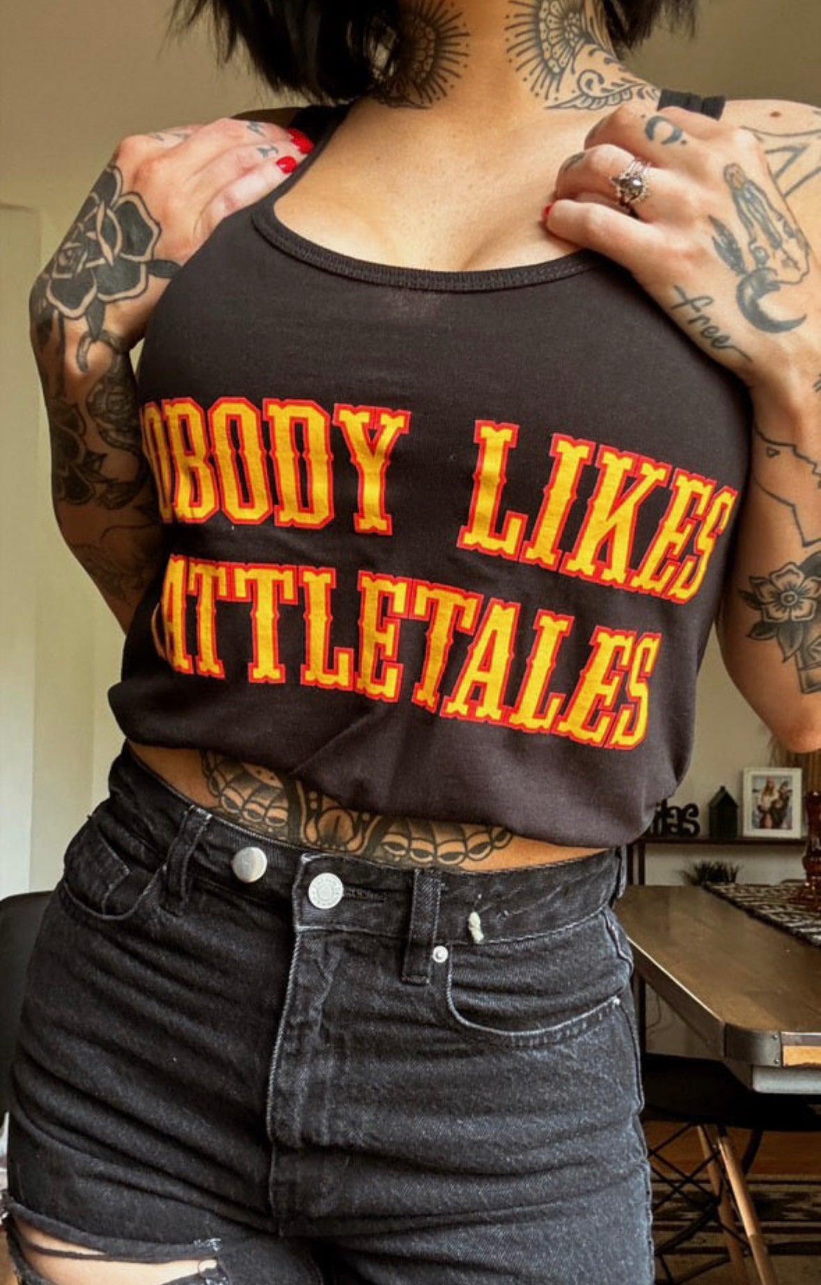 Tattletale tank top